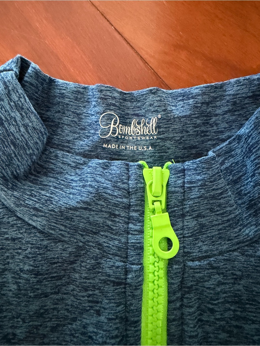 Bombshell Sportswear Heathered Blue Short Sleeve Top with Neon Yellow Zip - Picture 2 of 3